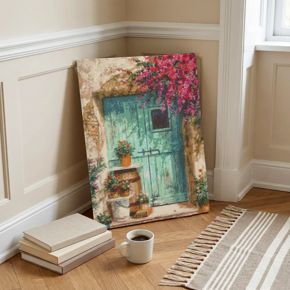 The Turquoise Door diamond painting leaning in a panelled room with books and a cup of coffee